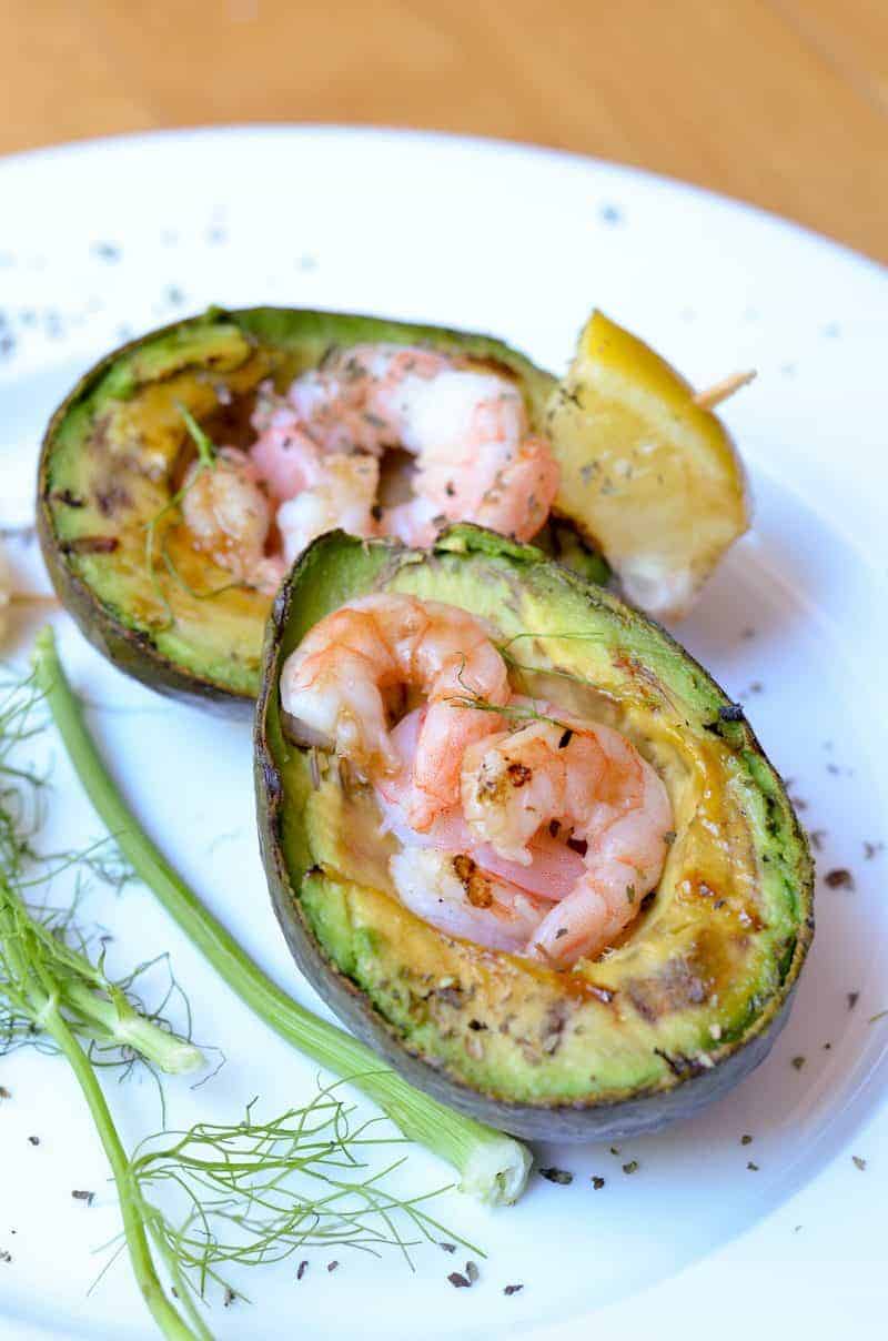 Need a healthy recipe for BBQ season that sets you apart from the rest of the potato salad crowd? Try this grilled avocado with shrimp salad recipe!