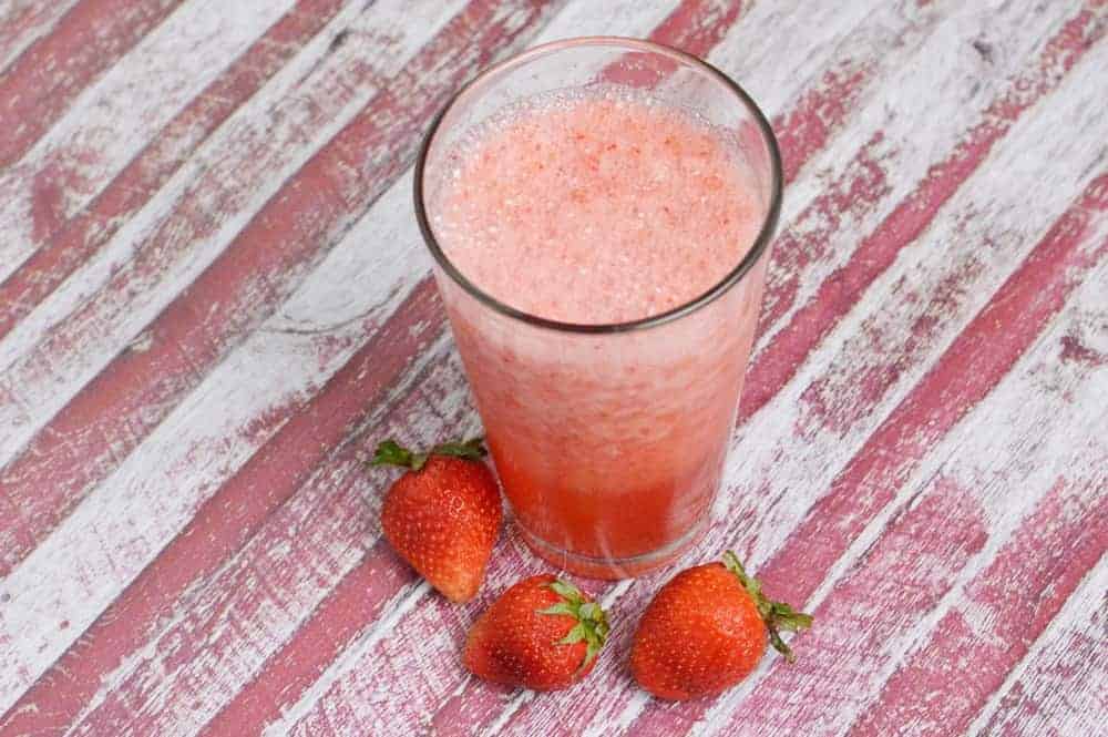 With the hot weather upon us and fresh strawberries in my farmer's market, I thought I would try making a sparkling strawberry smoothie recipe. It’s the perfect summer drink for those lazy days lounging on the deck reading a good book! The fizz makes it so refreshing! The recipe is for a sugar-free smoothie, but you can also make it with sugar or natural sweeteners.