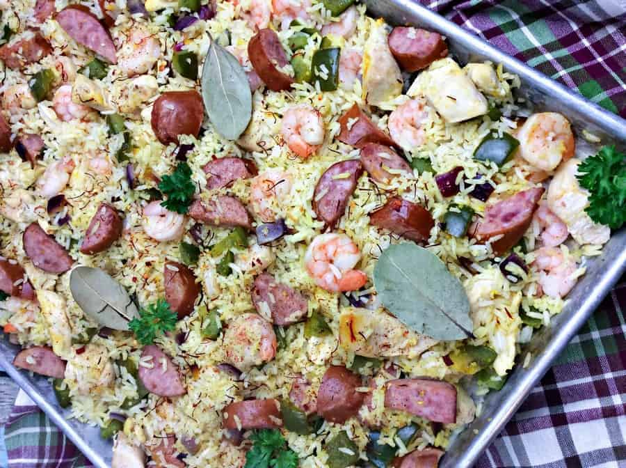 We've got a delicious sheet pan Spanish Paella recipe that's easy enough to make for a mid-week family meal, yet elegant enough for your upscale dinner parties! Read on to check it out!